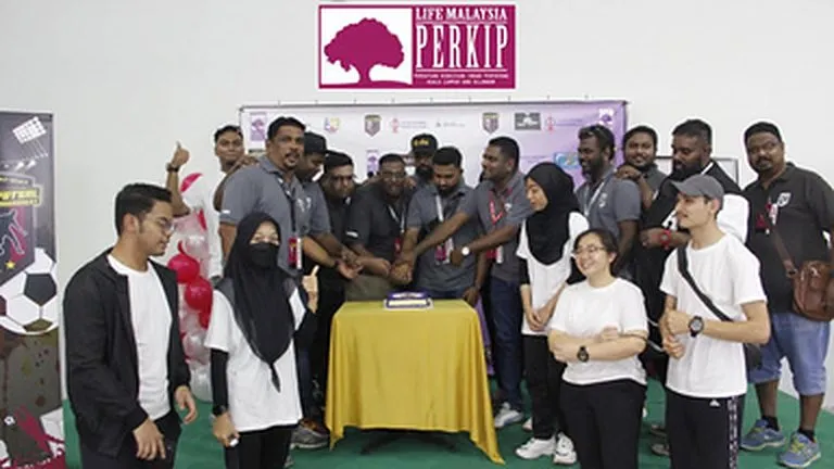 Players and organisers at the 2022 charity futsal